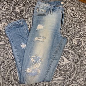Super distressed light wash jeans